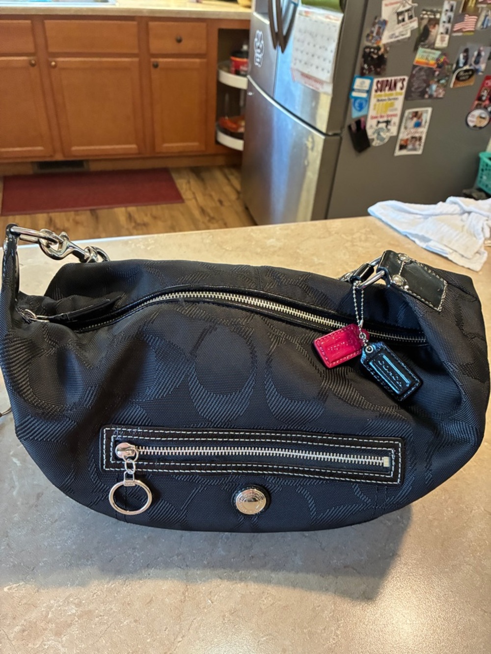 Coach Black Shoulder Bag with Silver Hardware and Pink/Black Tags